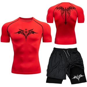 Close-up of red compression shirt and black double-layer shorts with tribal print