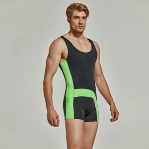 Detail view of side neon green splicing on dark gray men's nylon athletic bodysuit