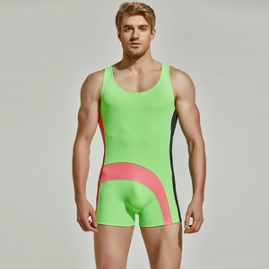Close-up of neon green men's bodysuit with contrast pink and black patchwork details