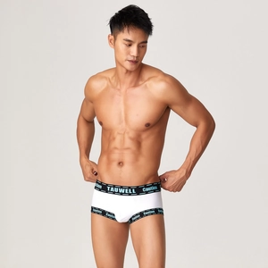 Close-up of white ribbed fabric and branded elastic waistband on men's sports boxer briefs
