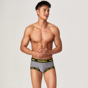 Close-up of ribbed sports underwear for men featuring Caution text on the waistband
