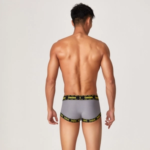 Men's grey boxer briefs featuring Caution lettered waistband with a ribbed texture detail