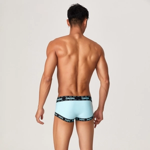 Rear view of men's athletic low-rise trunks featuring Caution printed elastic waistband