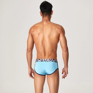 Rear view of men's low rise modal brief with elastic waistband and blue piping detail