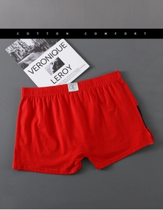 Détail du boxer pour homme en coton rouge avec taille élastique et bande latérale