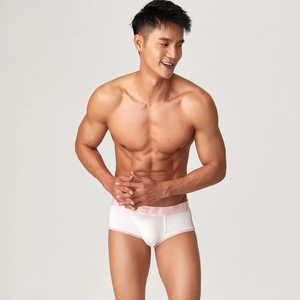 Detail of white modal briefs for men with pink contrast waistband and brand logo
