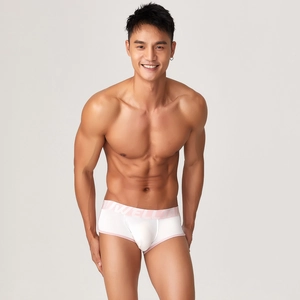 Detail of men's modal boxer briefs featuring white body and pink jacquard logo waistband