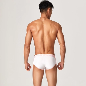 Rear view of white men's modal briefs with pink piping and brand logo on elastic waistband