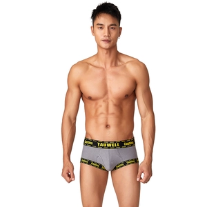 Men's low rise gray boxer briefs featuring caution yellow lettered elastic waistbands
