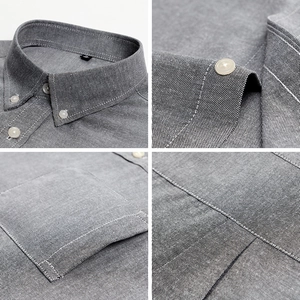 Mens dark grey Oxford button-down shirt featuring a chest pocket and textured fabric