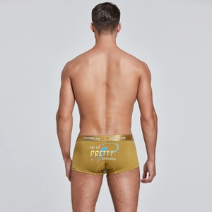Rear view of yellow boxer briefs featuring a blue lightning bolt and text print detail