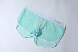 Detaillierte Flachbildansicht der mintgrünen Herren-Boxershorts aus Netzstoff mit Gummibund