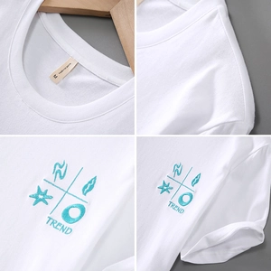 T-shirt homme en lin blanc à manches courtes avec broderie bleue et col rond élégant