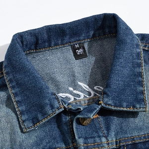 Men's blue denim vest with white embroidery on the back and vintage metal buttons