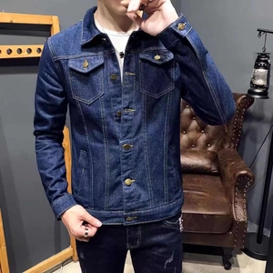 Detailed close-up of a men's casual dark wash denim jacket with metal buttons