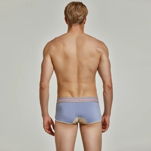 Vue arrière du boxer tissé pour hommes montrant le patchwork bleu et beige et la taille