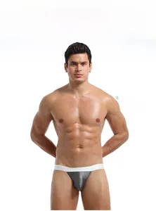 Detailed front view of men's low-rise thong in metallic grey with wide elastic waistband