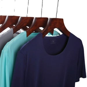 Men's ice silk crew neck T-shirts in blue, green and grey colors on wooden hangers