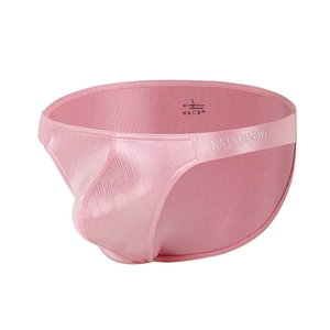 Detail of pink men's ribbed briefs with elastic waistband and gold foil size label