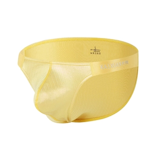 Detail view of yellow men's briefs fabric texture with elastic waist and logo