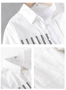 Close-up detail of white casual shirt showing collar, buttons and striped pocket texture