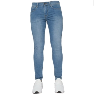 Detailed view of light blue slim fit denim pants with washed effect and metal button