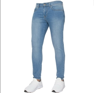 Close-up of slim-fit men's skinny jeans in light blue wash with classic five-pocket design
