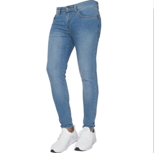 Detailed close-up showing light blue slim fit denim fabric and stitching on men's jeans