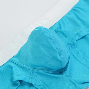 Men's blue low-rise boxer briefs with breathable mesh texture and elastic waistband