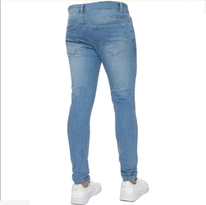 Rear view detail of slim fit light blue men's jeans with classic pockets and stitching
