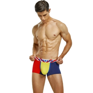 Close-up of men's low-rise boxers with vibrant red, yellow, and blue color stitching