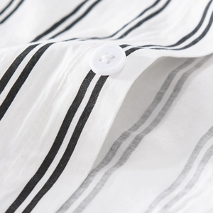Men's casual striped short sleeve shirt with white button detail and cotton texture
