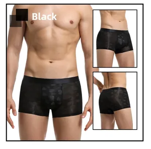 Detail view of black sheer mesh boxer briefs featuring heart and 520 jacquard patterns