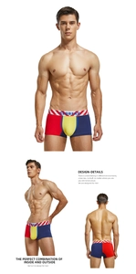 Detail view of men's low rise color block boxer briefs with striped branded waistband