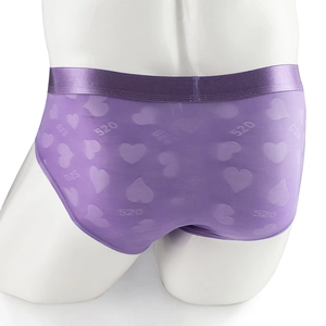 Men's purple jacquard briefs with heart patterns and breathable mesh fabric on a mannequin