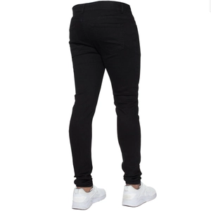 Detail view of the back of men's slim fit black denim jeans with pockets and belt loops