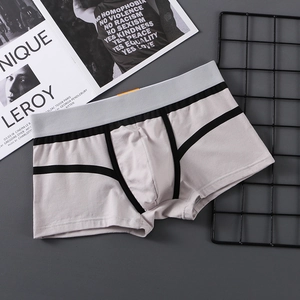 Men's light grey striped boxer briefs with elastic waistband and orange label detail