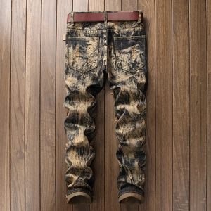 Men's retro distressed straight leg jeans with belt on dark wooden background