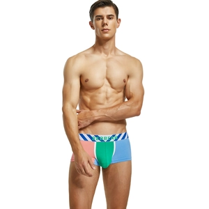 Detail view of men's low waist boxer briefs with colorful patchwork and striped waistband