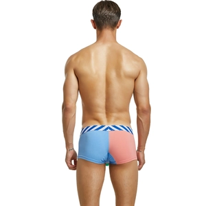 Rear view of men's low rise boxer briefs featuring blue and pink color-block knit design