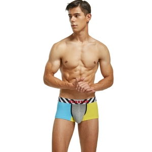 Detail view of men's low-rise boxer shorts with color-block knit and branded waistband