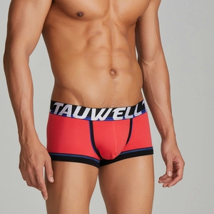 Red men's low-rise boxer briefs with contrasting black waistband and blue accents