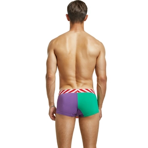 Rear view of men's low-rise trunks featuring purple and green color-block knit fabric