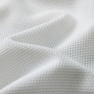 Macro shot of high-quality white breathable honeycomb mesh fabric on men's underwear
