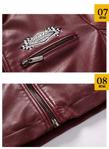 Close-up of wine red faux leather jacket featuring brand embroidery and metal zipper