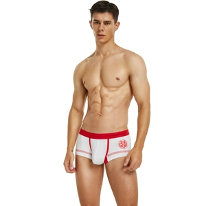 Detail of men's white boxer briefs with red festive Xi character and elastic waistband