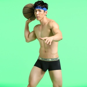 Close-up of men's black low-rise boxer briefs with jacquard athletic waistband detail