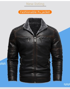 Detail of men's faux leather jacket with faux fur lining and stand-up collar