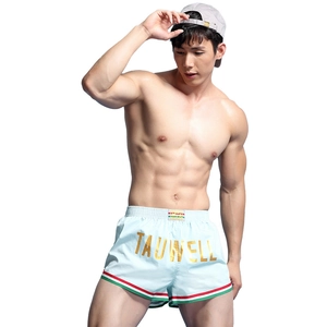 Men's light blue sports shorts with gold TAUWELL waistband and tricolor side stripes