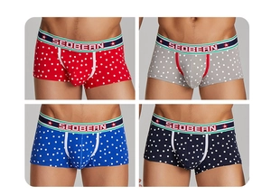 Detail showing four colors of low-rise boxer briefs with star print and elastic waistband